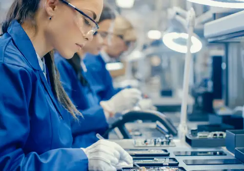 Workers with CircuiTek Solutions performing precise PCB assembly in Schaumburg IL