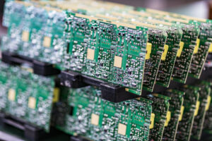 A stack of PCB boards after complete PCB assembly in Schaumburg IL from CircuiTek Solutions PCB Services Naperville IL