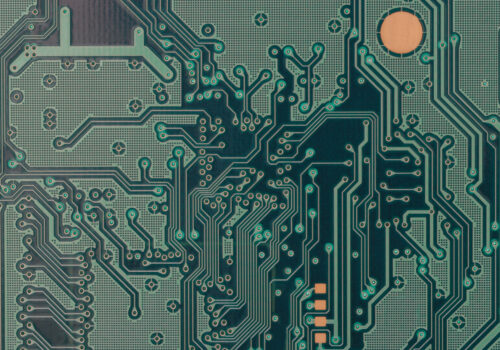 a green circuit board illustrates Improved Vibration Resistance in Your Electronic Device