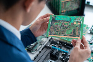 A man researches Impedance Traces on PCB Design